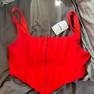very cute forever 21 corset-style top. new with tags and never worn.